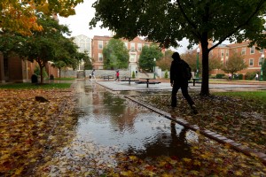 Wake Forest students walk across campus during a severe thunderstorm on Wednesday, October 27, 2010.