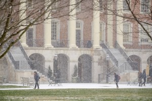 Wake Forest students walk across Hearn Plaza during a snowstorm on Wednesday, January 20, 2016.