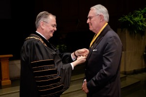 Wake Forest University holds its annual Founders' Day Convocation in Wait Chapel on Thursday, February 18, 2016. James T. Jim Williams (62, JD 66, P 89, P 92, P 96) receives the Medallion of Merit from President Nathan O. Hatch.