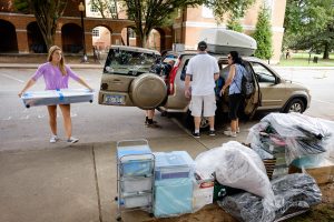 Wake Forest hosts move-in day for first year students at the south campus residence halls on Friday, August 21, 2015.  Tom and Doreen Ineson unload the car and the rooftop carrier as their daughter Courtney ('19) moves into her room.